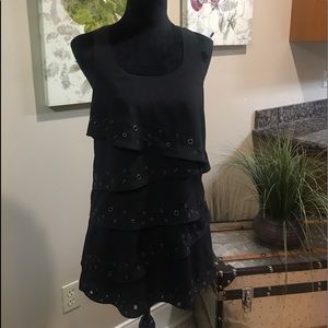 Black tunic with layers and  metal eyelets